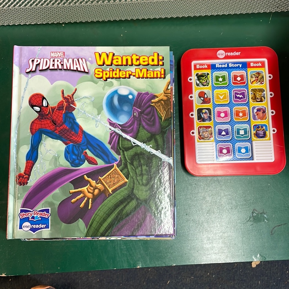 me reader with 8 Marvel books
